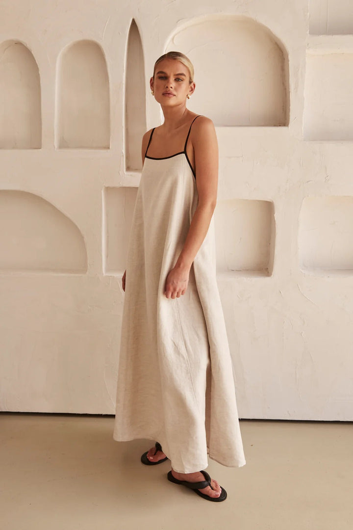 Versatile women's cream maxi dress with spaghetti straps, square neck & contrast trim. Perfect for casual or elegant summer.