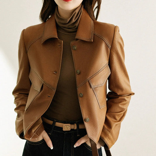 Women's cropped blazer jacket with structured lapel in a modern, versatile style.