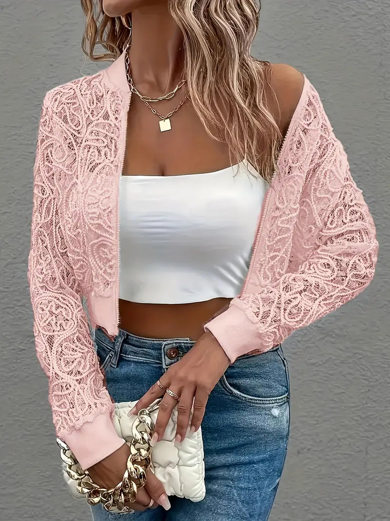 Elegant cropped lace bomber jacket, perfect feminine outerwear.