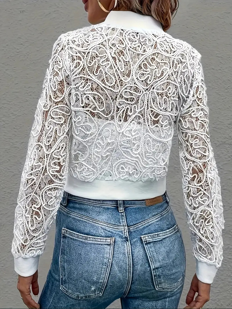 Feminine cropped bomber jacket with delicate lace details.