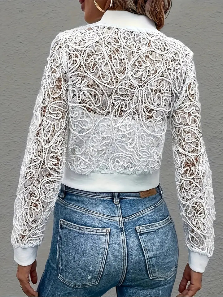 Feminine cropped bomber jacket with delicate lace details.