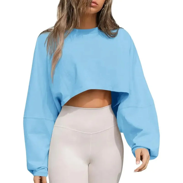 Relaxed fit women's oversized cropped crewneck sweatshirt, perfect for comfortable athleisure wear.