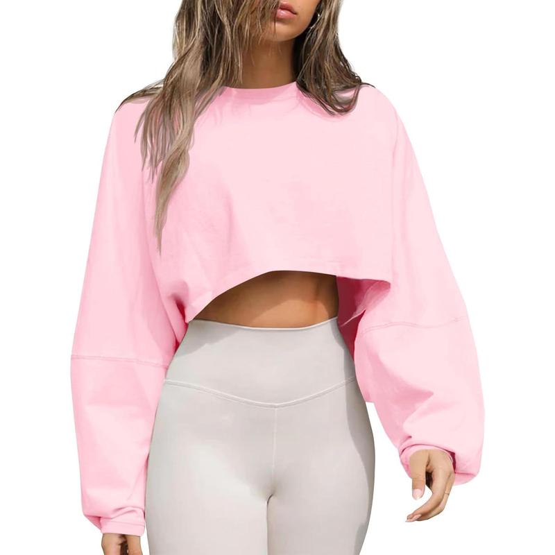 Trendy cropped oversized sweatshirt for women, featuring a classic crewneck design for everyday wear.