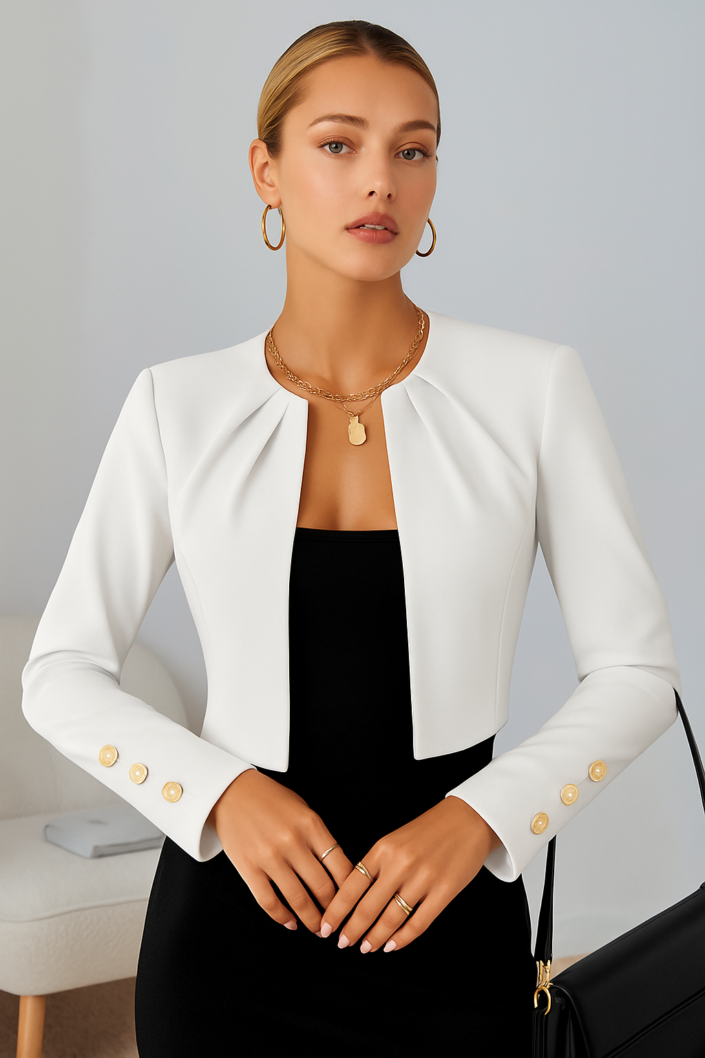 Modern women's cropped blazer, tailored for a chic, contemporary look in office wear and evening attire.