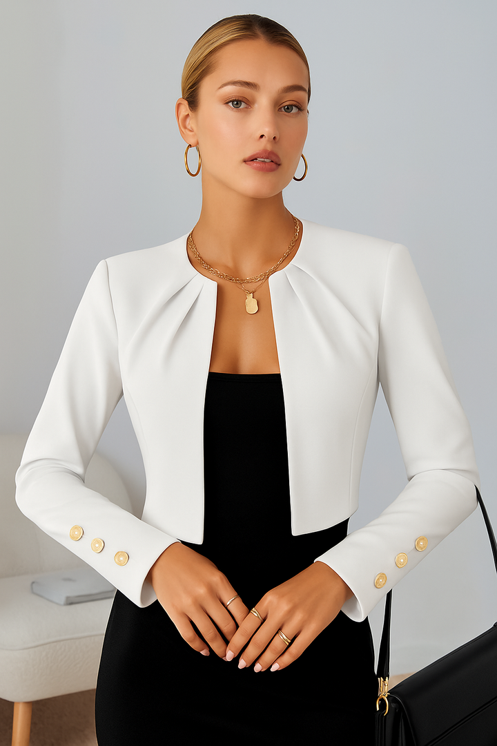Modern women's cropped blazer, tailored for a chic, contemporary look in office wear and evening attire.
