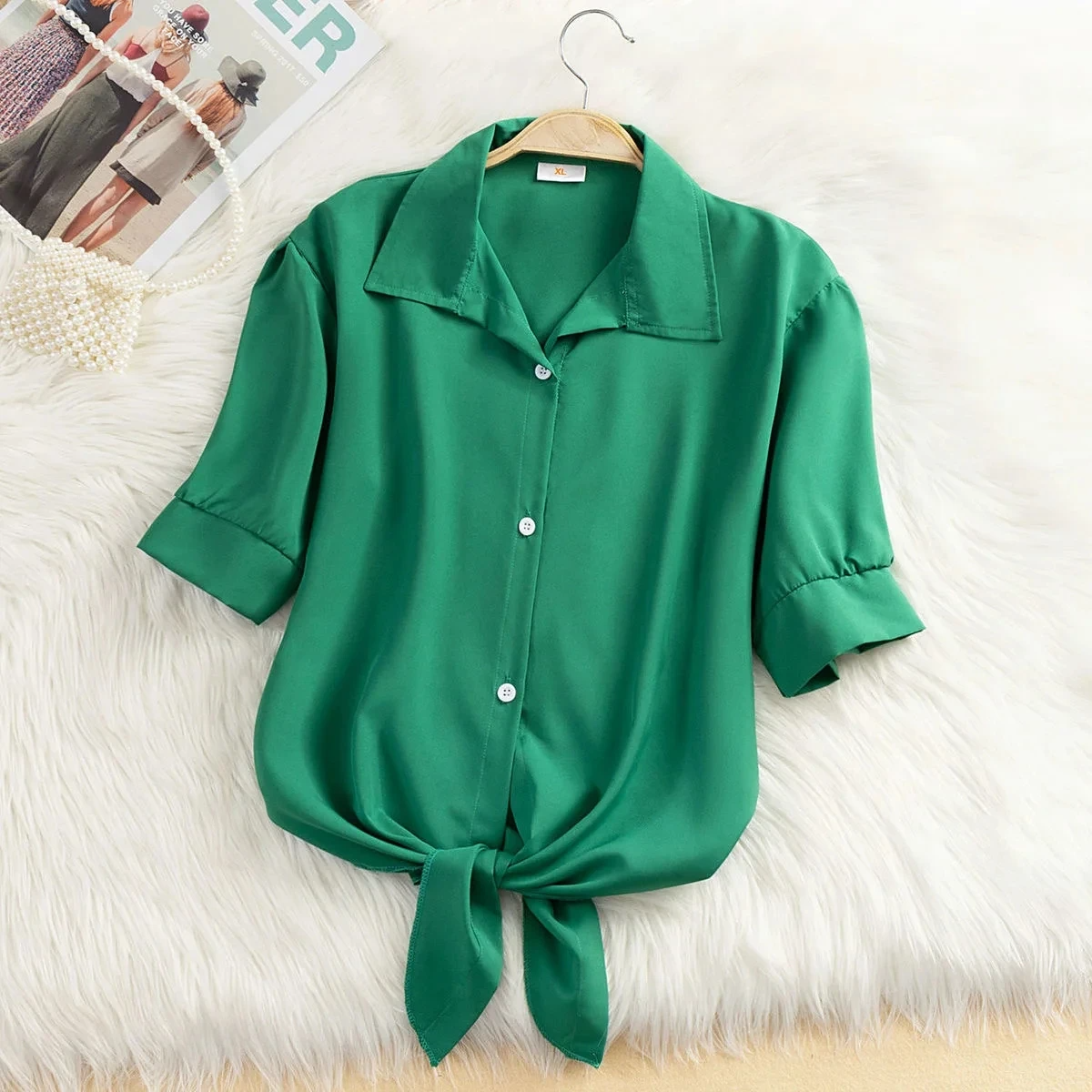 Women's cropped tie-front blouse, a stylish and versatile summer top for casual or elegant outfits.