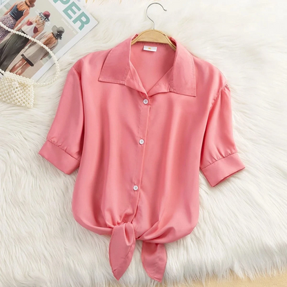 Green women's cropped tie-front blouse with short sleeves, perfect for summer casual wear.