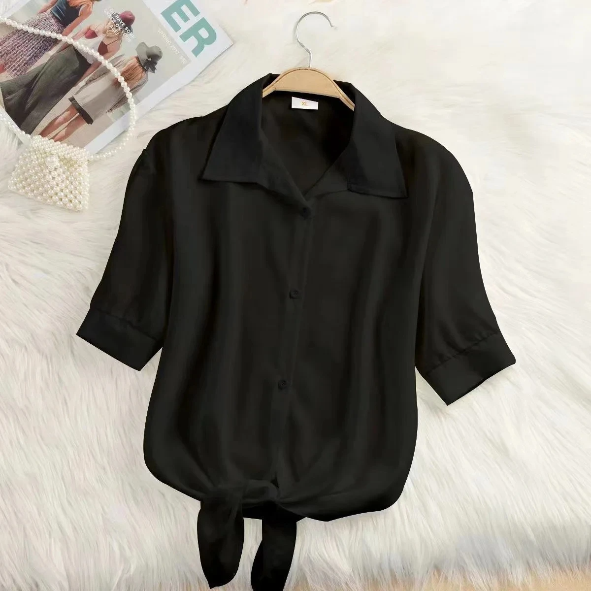 Pink women's elegant cropped tie-front blouse, ideal for a chic summer look or versatile styling.