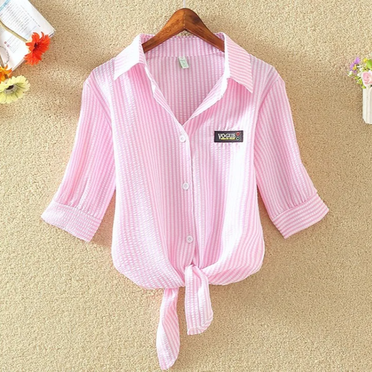 Elegant black women's cropped tie-front blouse, offering effortless style for summer occasions.