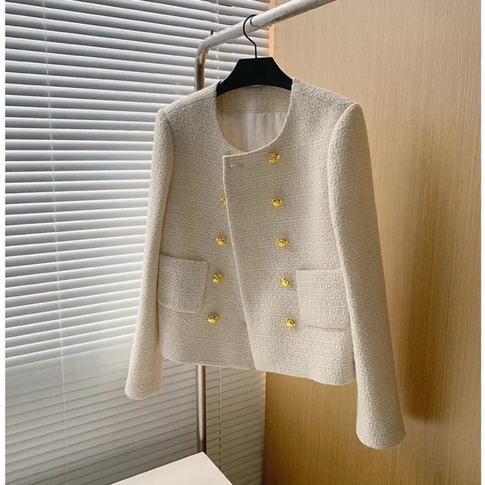 Versatile women's cropped tweed blazer, offering a chic modern style for casual or professional wear.