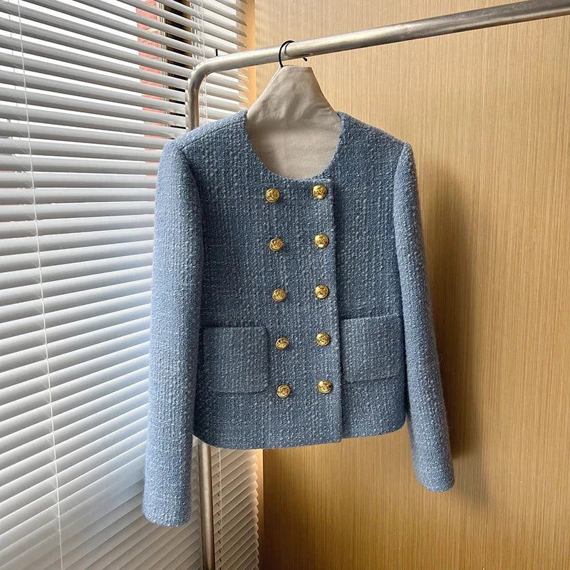 Elegant women's cropped tweed blazer jacket, ideal for a sophisticated professional or stylish casual look.