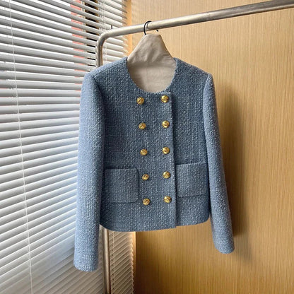 Elegant women's cropped tweed blazer jacket, ideal for a sophisticated professional or stylish casual look.
