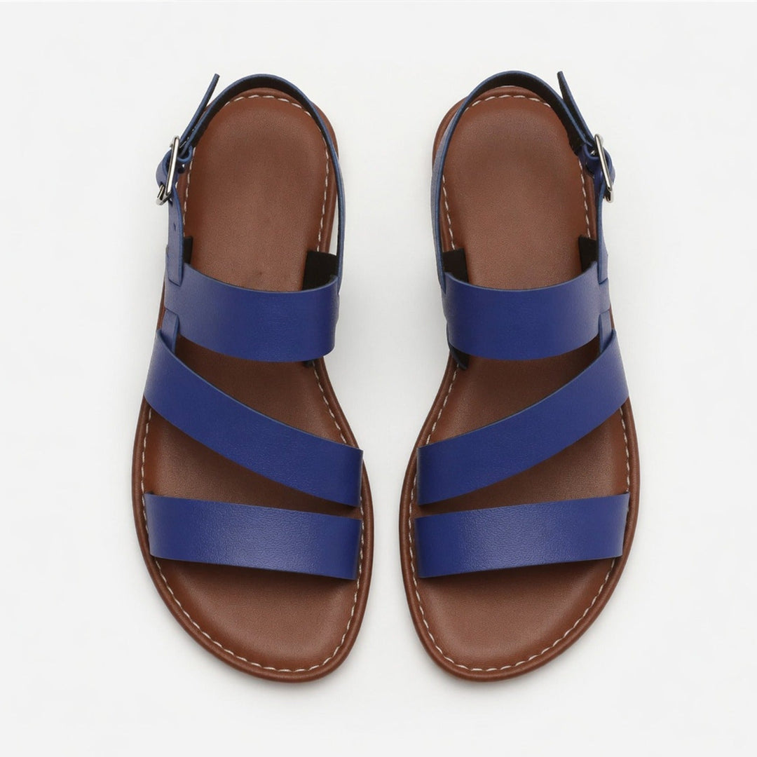 Women's casual flat sandals with an open toe & crossover strap for ultimate summer comfort.