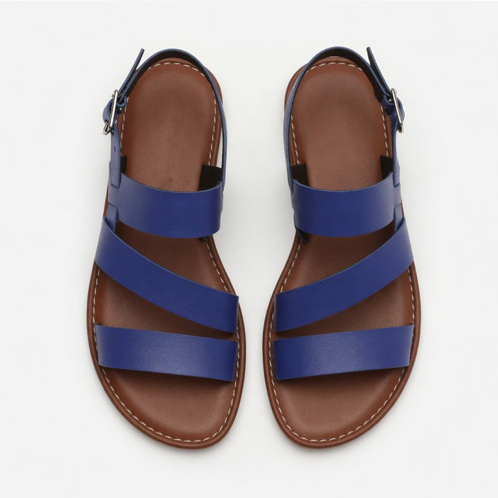 Women's casual flat sandals with an open toe & crossover strap for ultimate summer comfort.