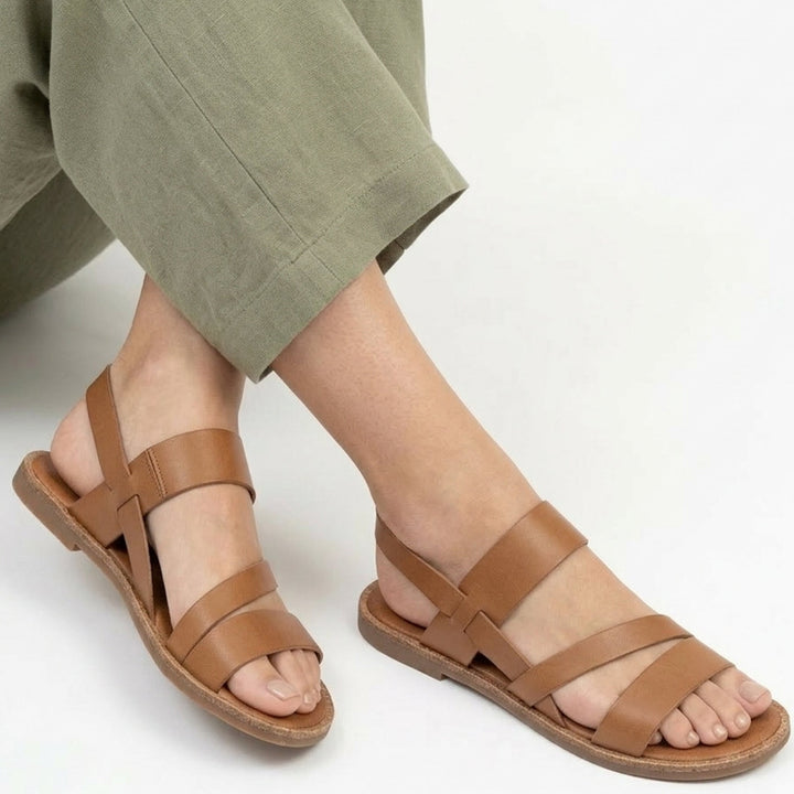Everyday women's crossover strap flat sandals, providing open-toe comfort for all your summer activities.