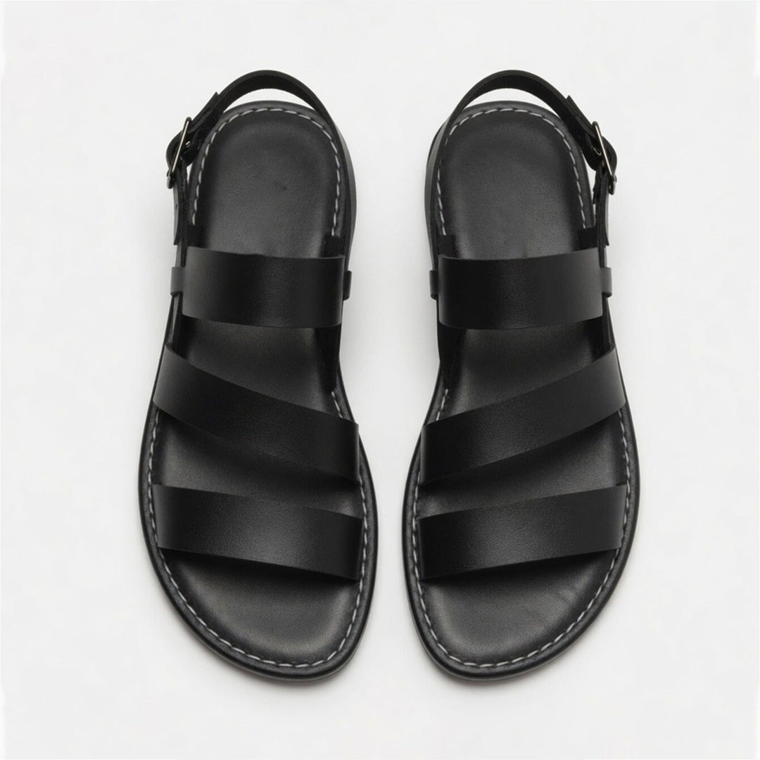 Lightweight women's flat sandals, open-toe & crossover strap design, essential for summer comfort.