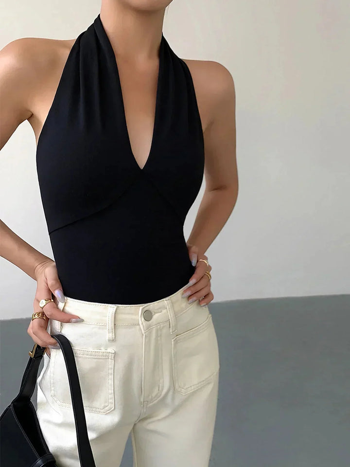 Women's crossover V-neck halter top. Sleeveless, slim fit, perfect for elegant summer and spring fashion.
