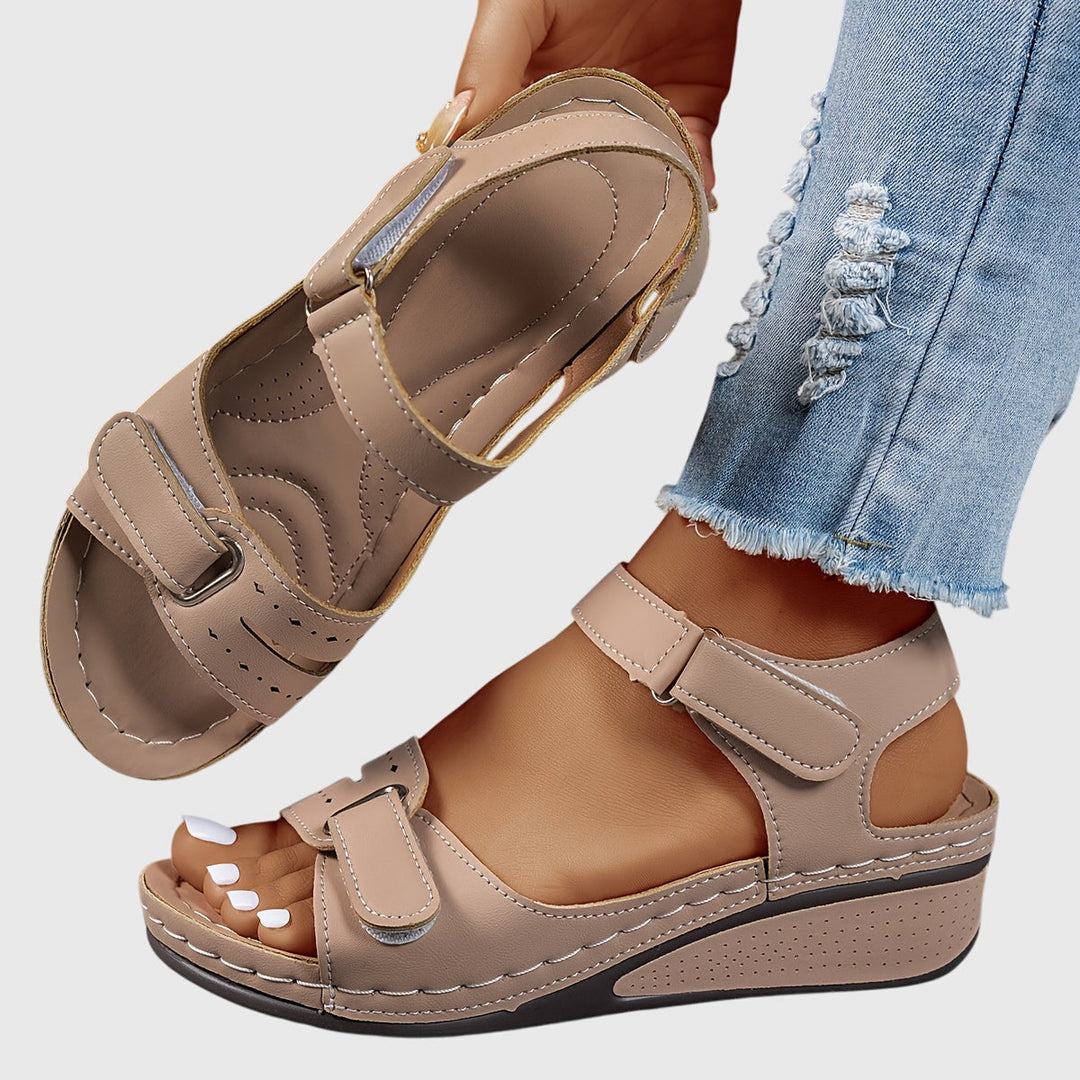Elegant women's crystal embellished orthopedic sandals, comfortable slip-on style with supportive arch.