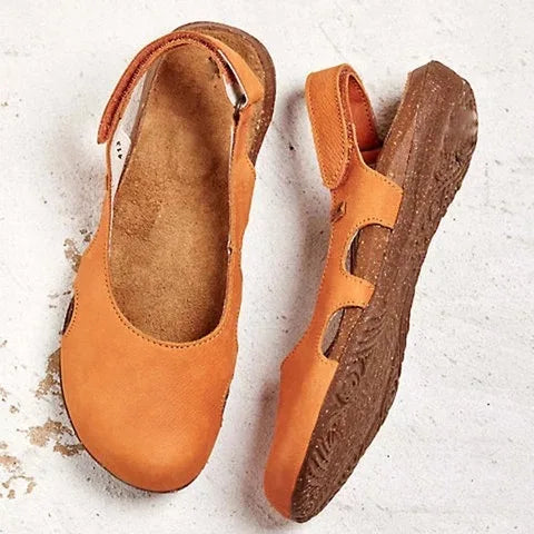 Comfortable women's orthopedic sandals, featuring cushioning, adjustable straps, and arch support for feet.