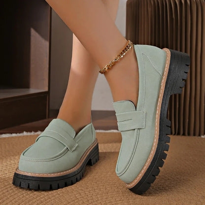 Comfortable women's platform loafers with cushioned orthopedic support & stylish slip-on design.