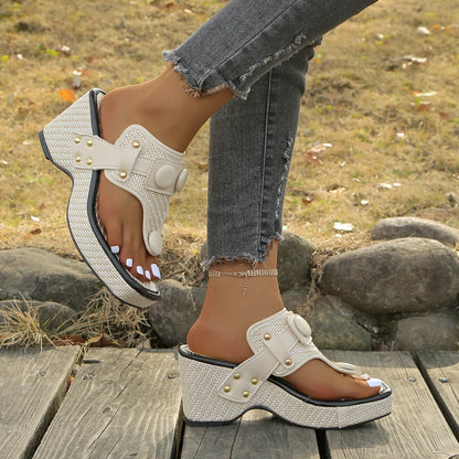 Everyday women's casual platform slides, offering comfortable wear with studded embellishments.
