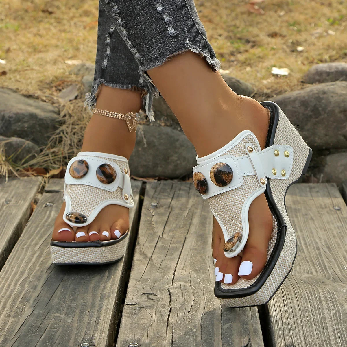 Comfortable studded platform slip-on sandals for women, ideal for summer casual wear.