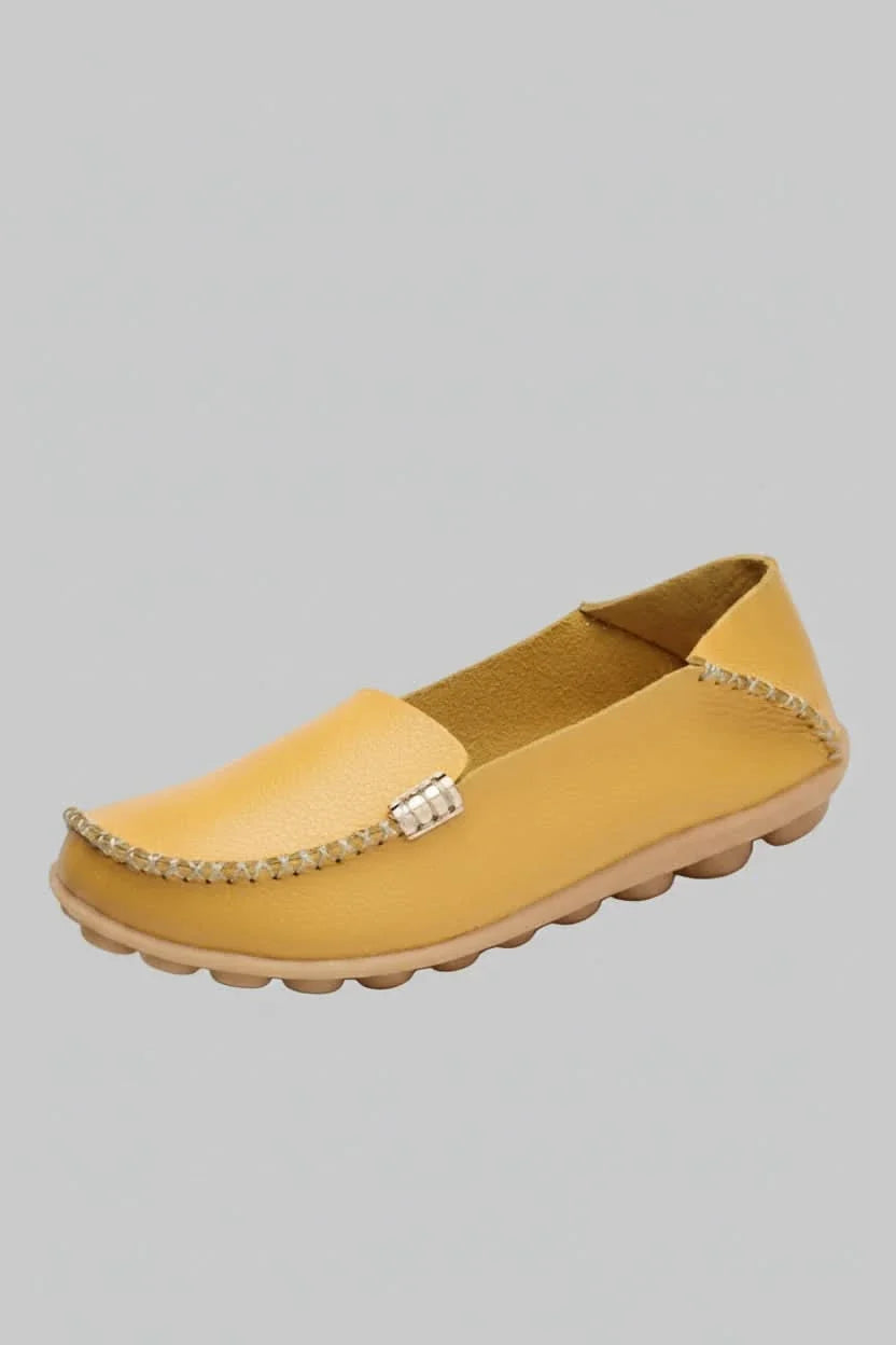 Comfortable women's travel flats featuring a cushioned round toe for easy, stylish wear.