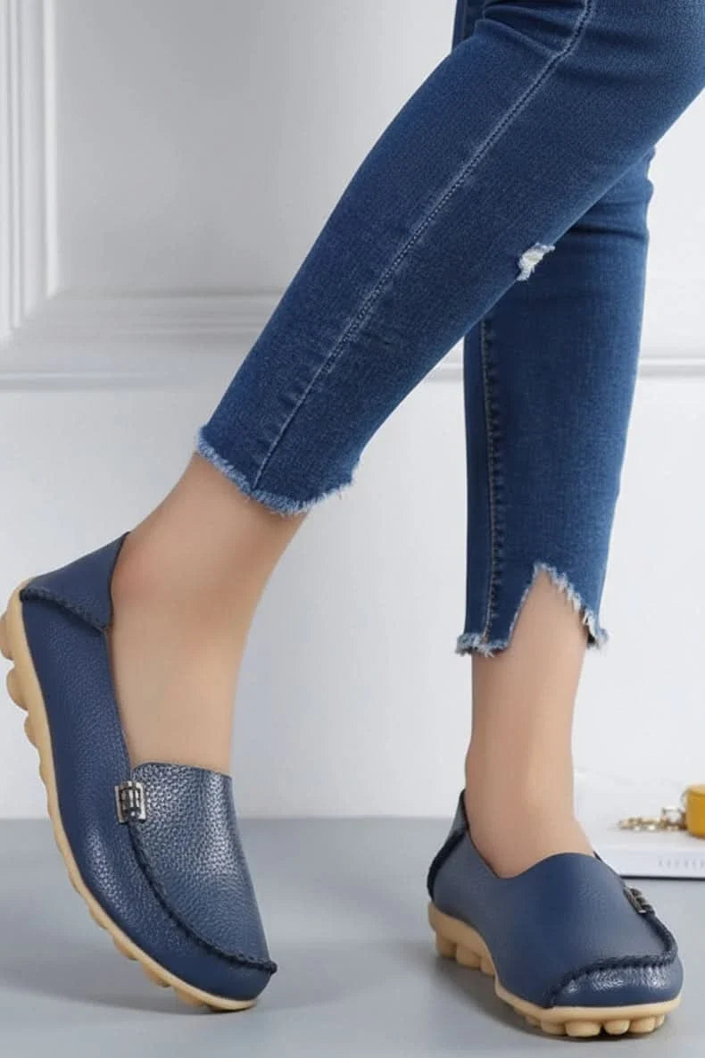 Comfortable women's flats, featuring a soft cushioned insole and classic round toe design.