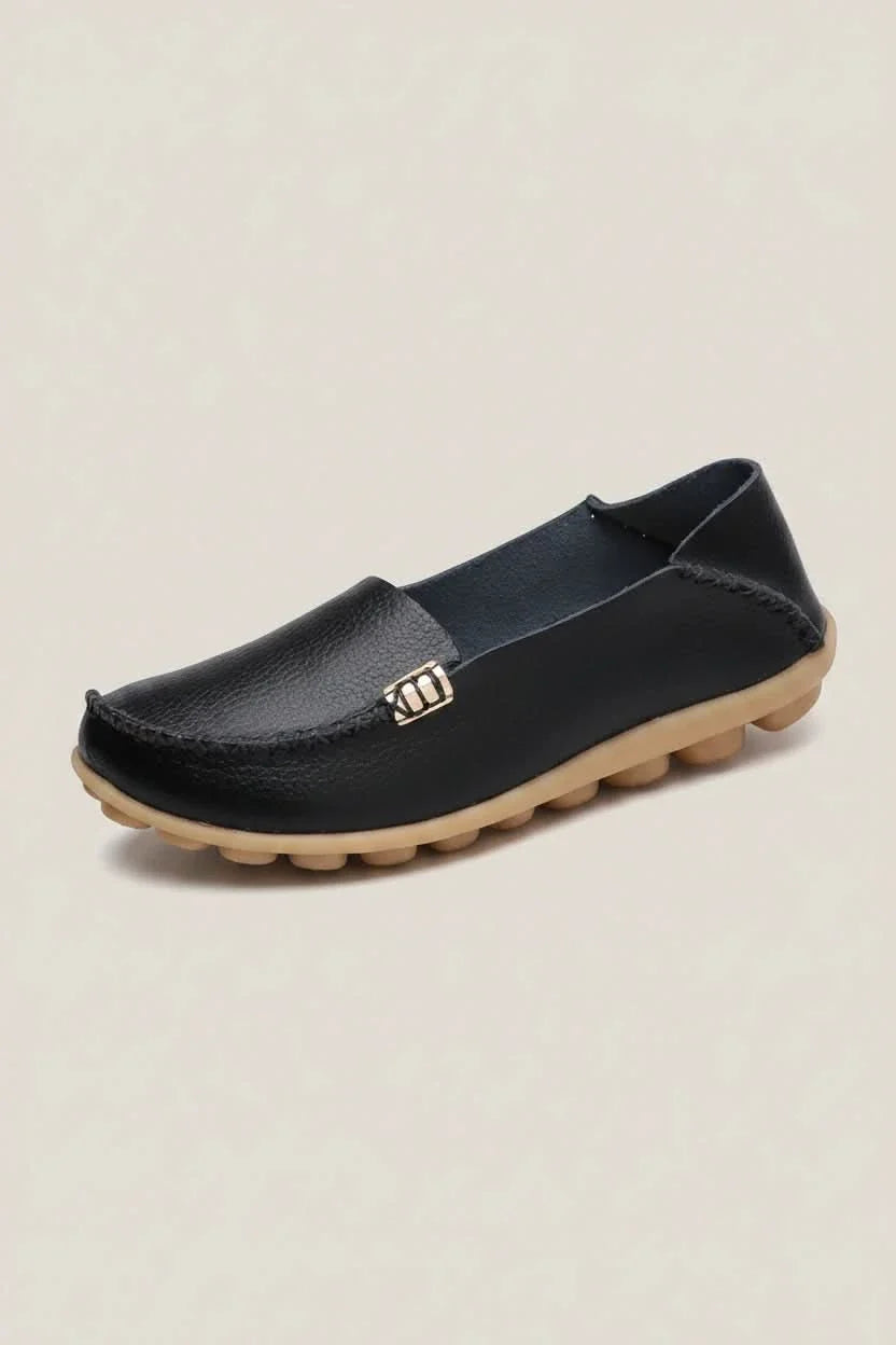 Casual women's slip-on shoes with a round toe & soft cushioning for everyday comfort.
