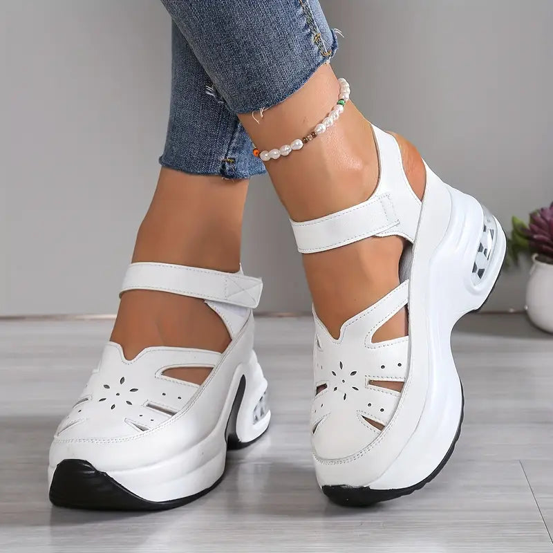Women's cushioned wedge platform sandals with breathable cutout design & adjustable strap for comfort.
