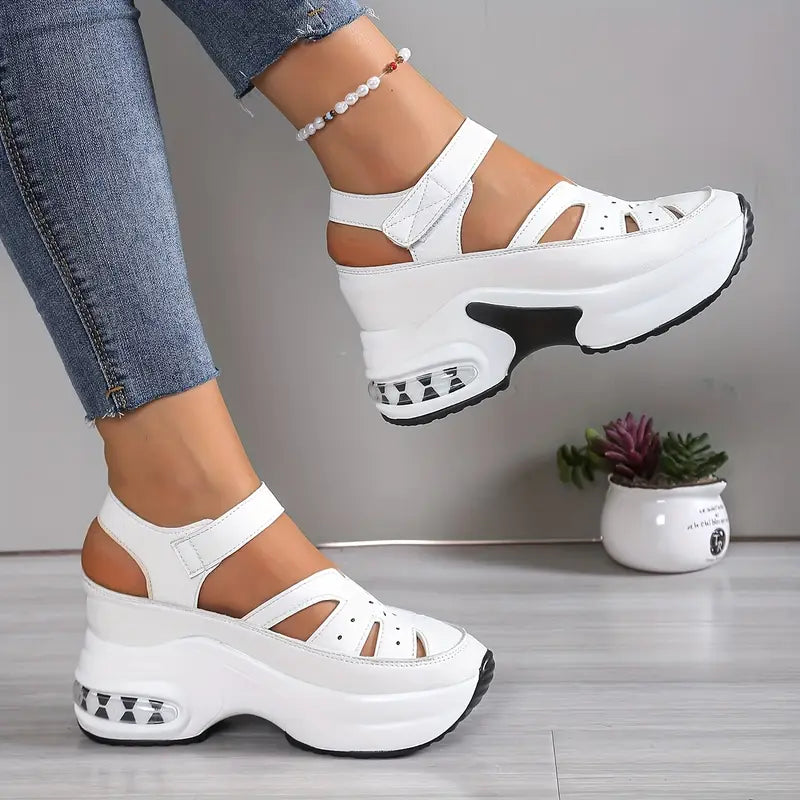 Casual women's platform wedge sandals. Breathable cutouts, adjustable strap, & cushioned sole.