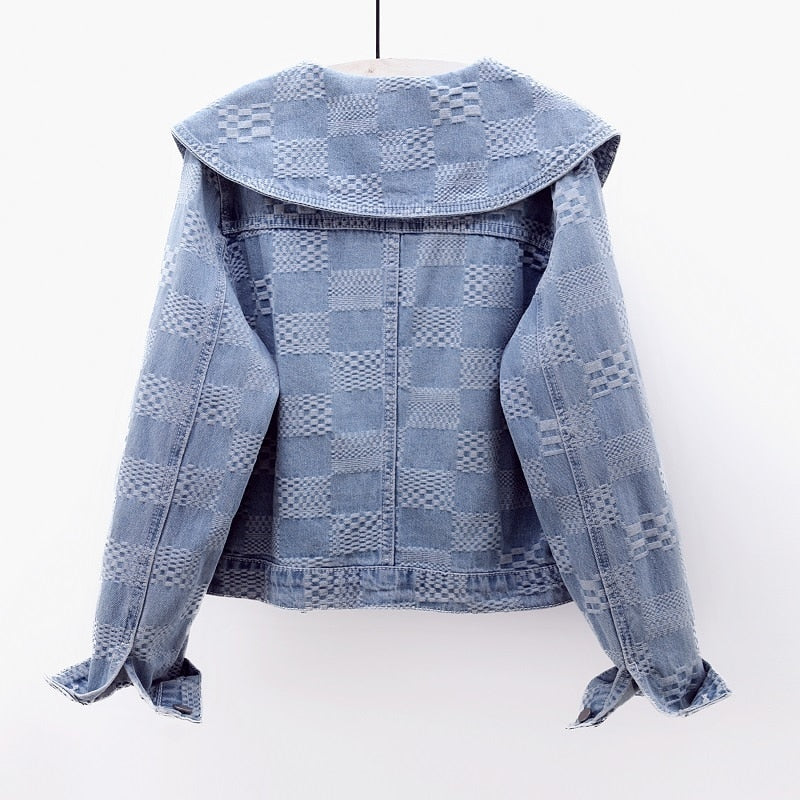 New arrival: Women's trendy cropped denim jacket in dark blue, essential outerwear for a chic, casual look.