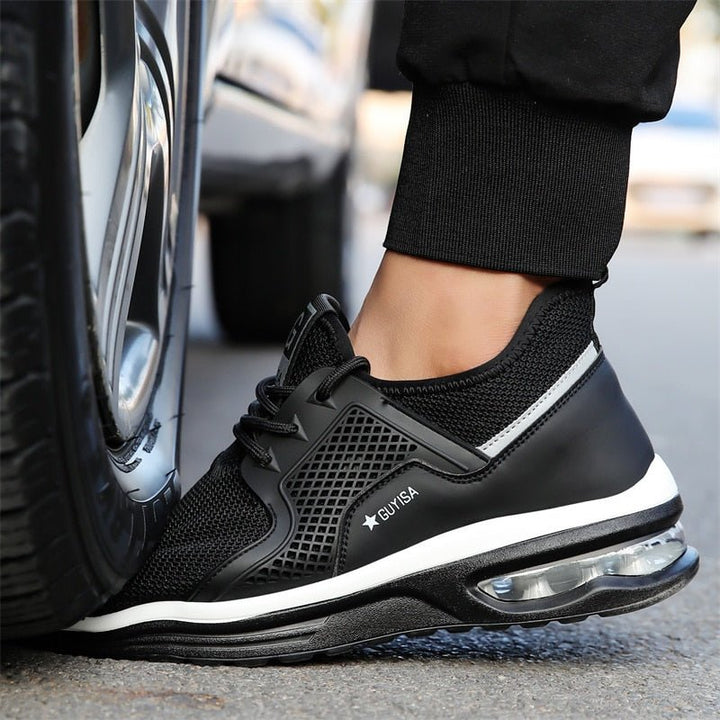Side view of women's black protective work sneakers. Features orthopedic support, durable design, and slip resistance.