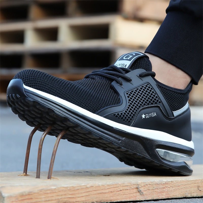 Close-up of the steel toe and robust fabric on women's protective safety work shoes, ensuring ultimate durability.
