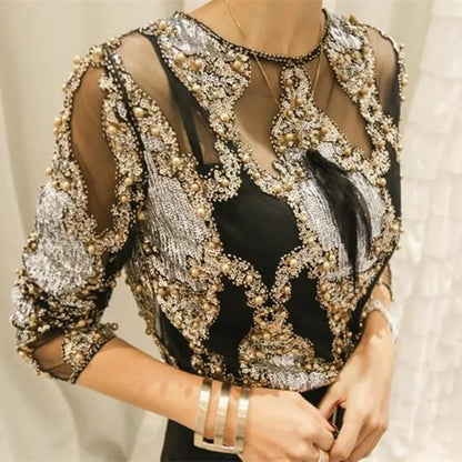 Shimmering gold sequin top for women. A chic, luxurious sparkle top ideal for party & evening wear.