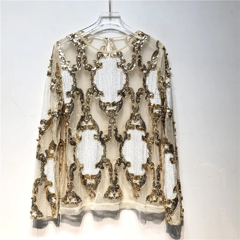 Dazzling sequin women's top. Shimmering, glamorous party wear, perfect for a chic evening fashion look.