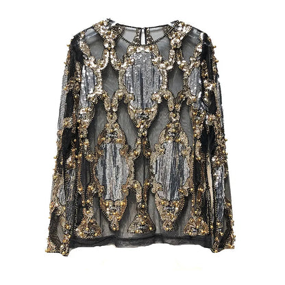 Women's statement sequin top. Sparkling black & gold design for glamorous, luxurious party & evening wear.