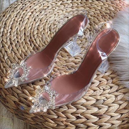 Elegant women's crystal-embellished clear high heels. Dazzling transparent pumps, ideal party & evening shoes.
