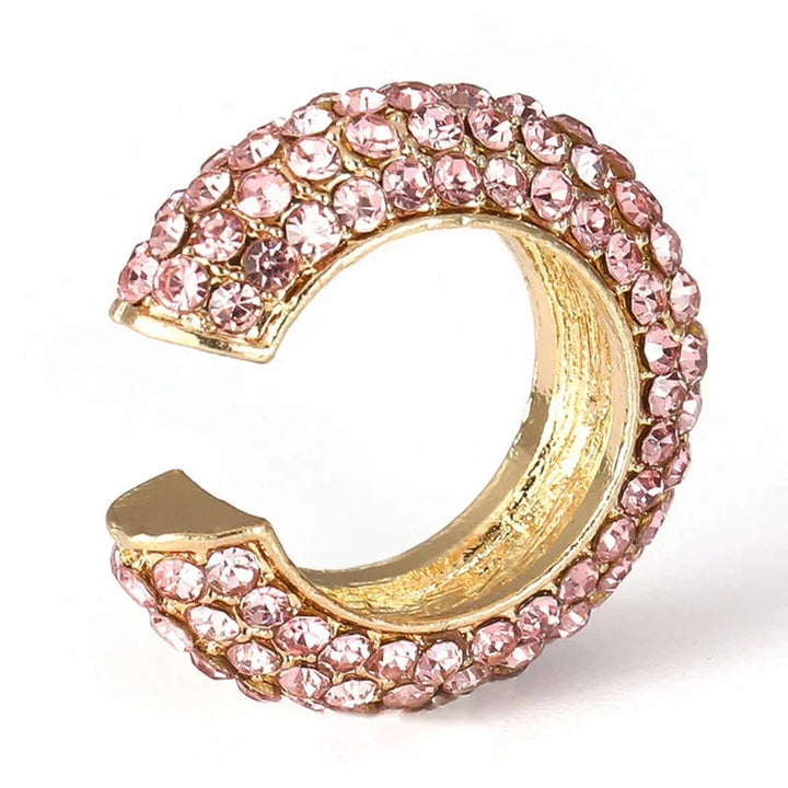 Detailed close-up of a dazzling pavé crystal no-piercing ear cuff, elegant women's jewelry.