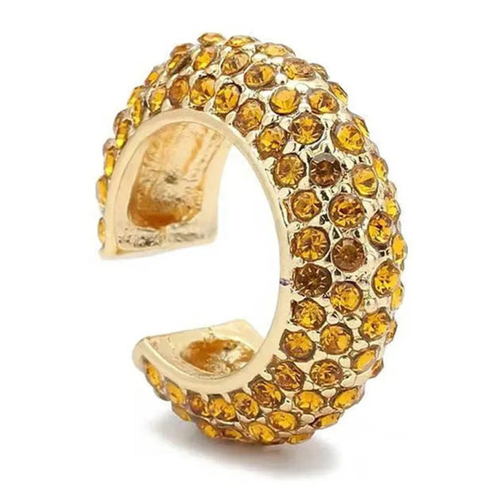 Women's silver-tone no-piercing ear cuff with dazzling pavé crystals. Fashion jewelry accessory.