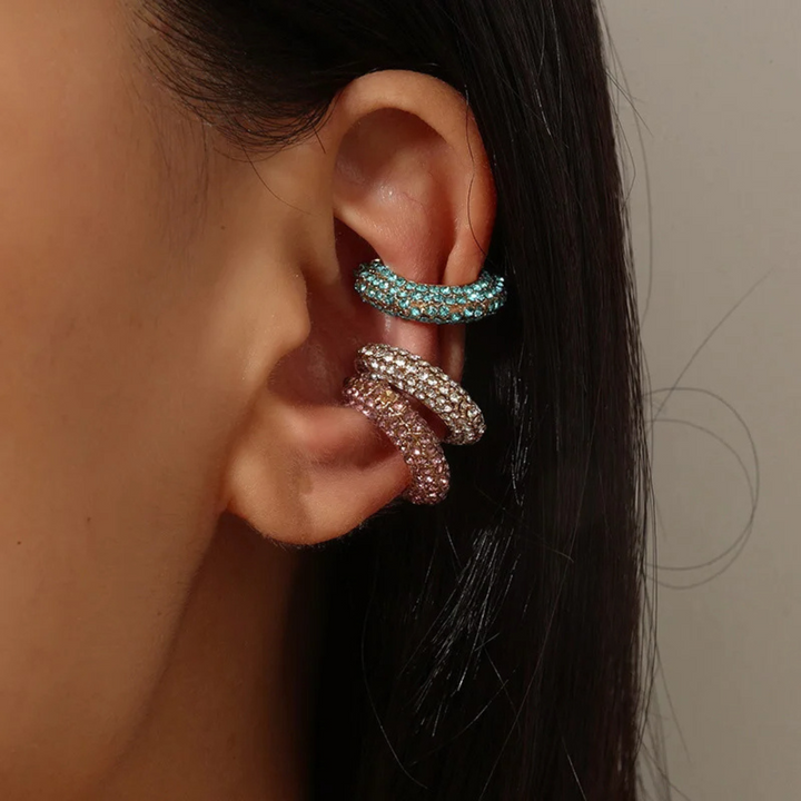 Chic women's gold-tone pavé crystal ear cuff, a stylish no-piercing fashion accessory.