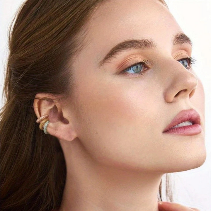 Silver-tone pavé crystal no-piercing ear cuff, elegant women's dazzling fashion accessory.