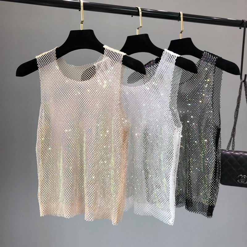 Glamorous women's evening top, sparkling rhinestone fashion for night out apparel.