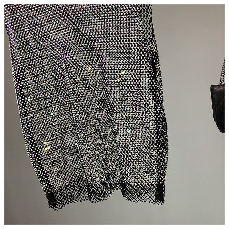 Dazzling rhinestone sleeveless tank top for women, perfect for stylish party wear.