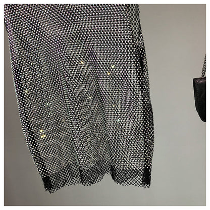 Dazzling rhinestone sleeveless tank top for women, perfect for stylish party wear.