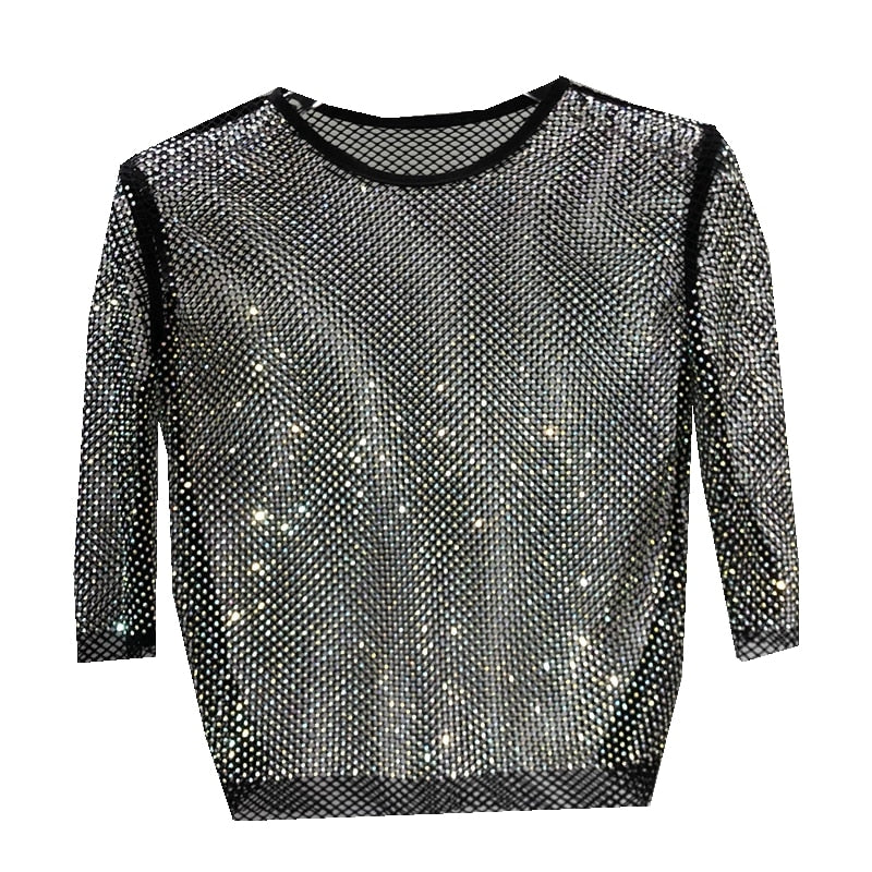 Dazzling sparkle shimmer party top, an eye-catching women's fashion statement for festive evenings.
