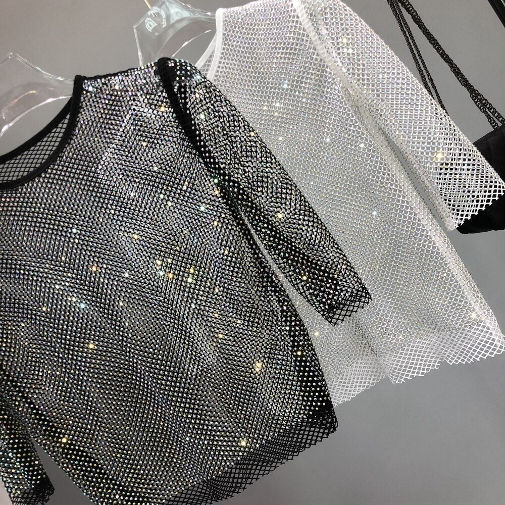 Women's glamorous shimmer party top with dazzling sparkle, ideal for evening events & parties.