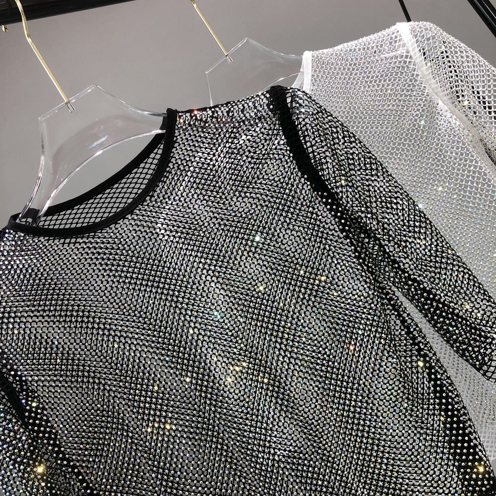 Shine in this women's dazzling shimmer party top, perfect for festive & glamorous occasions.