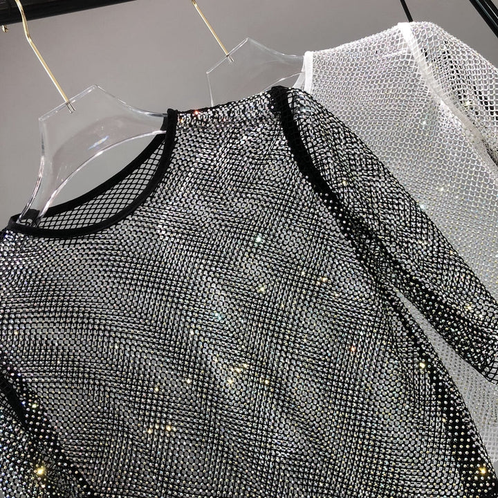 Shine in this women's dazzling shimmer party top, perfect for festive & glamorous occasions.