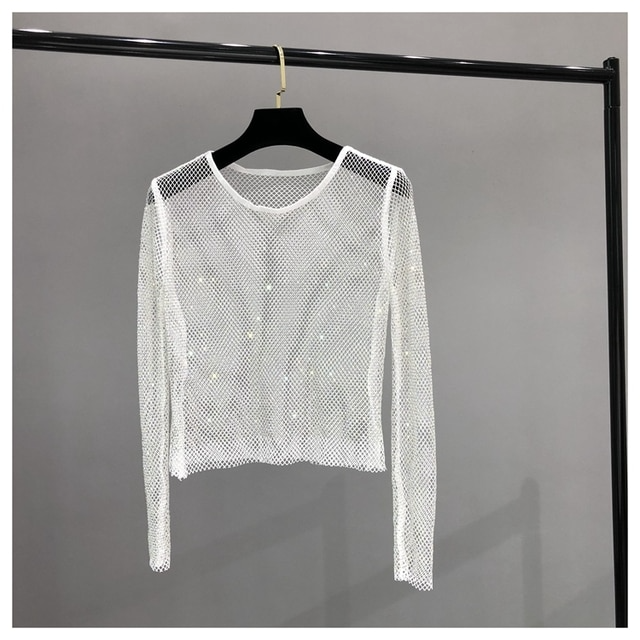 Versatile women's dazzling shiny long sleeve top, featuring rhinestone accents. Elegant for evening or party wear.